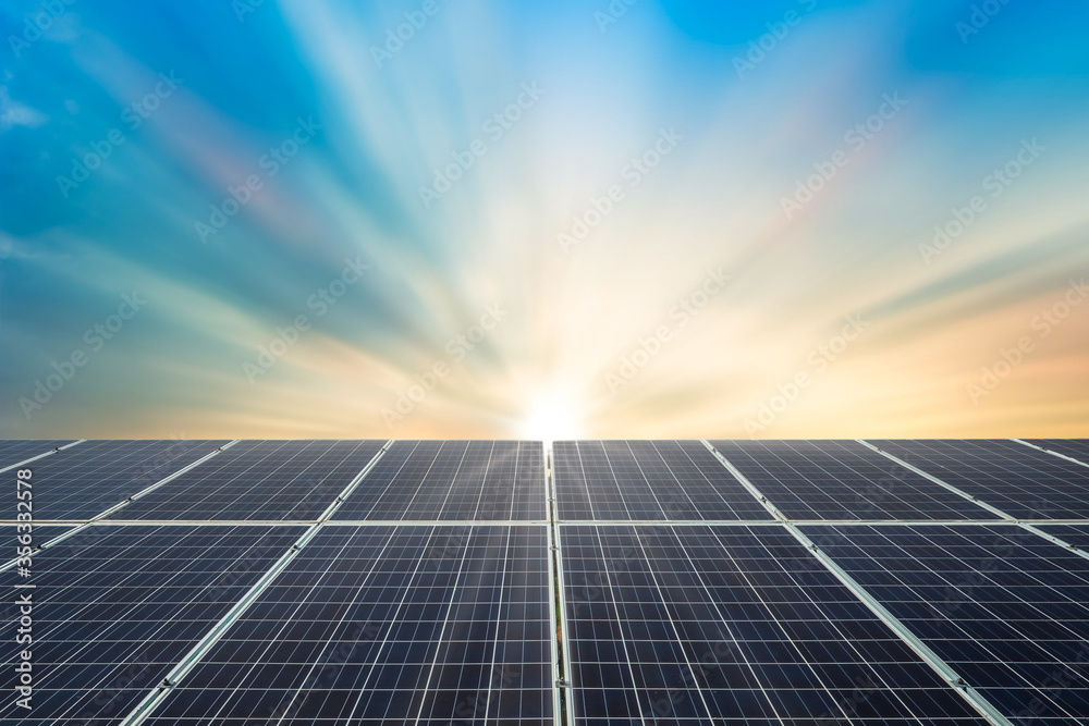 Solar panel cell on dramatic sunset sky background,clean Alternative power energy concept.