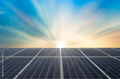 Obraz na płótnie Solar panel cell on dramatic sunset sky background,clean Alternative power energy concept. w salonie