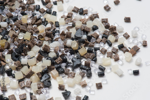 Obraz na plátně brown, black white an transparent polymer granulate and regrind for injection mo