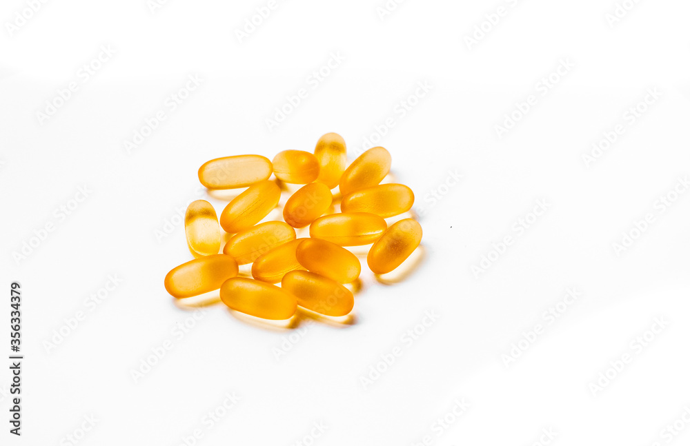 Omega 3 6 9 tablets on a white background. fish oil norwegian salmon. Omega 3 6 9 tablets on a white background. fish oil norwegian salmon.