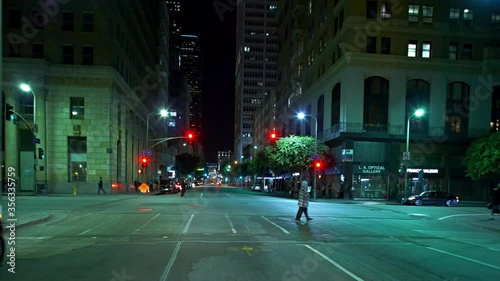 T/L WS POV Traffic on downtown streets at night / Los Angeles, California, USA