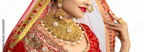 Obraz na plátně Beautiful girl with gold jewelry for woman ,necklace ,earrings and bracelet