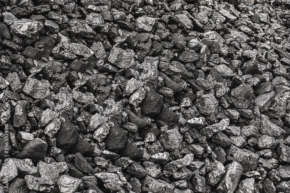 Texture coal. Natural black coals for background. Industrial coal. Coal mining. Shot CloseUp of black anthracite for background