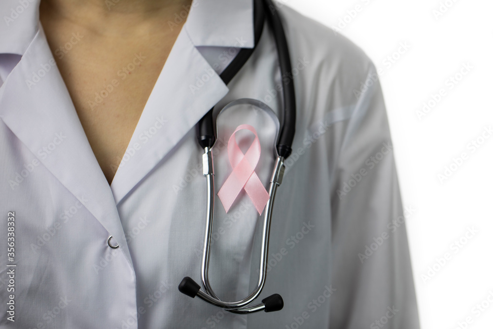 Close up female doctor in white medical coat and stethoscope with pink ribbon isolated on white background. Breast thyroid cancer awareness campaigns, symbol of october, medical sign Close up female doctor in white medical coat and stethoscope with pink ribbon isolated on white background. Breast thyroid cancer awareness campaigns, symbol of october, medical sign