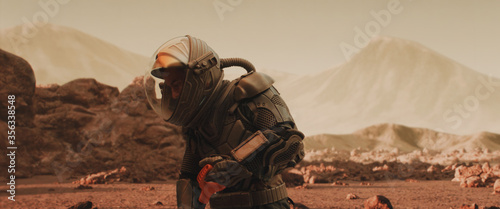 Εκτύπωση καμβά Caucasian male astronaunt in a space suit gathering materials on a planet surfac