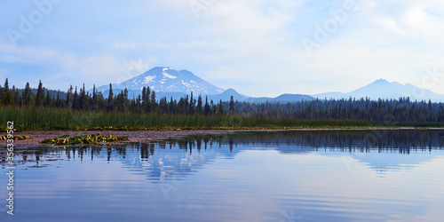 Panoramic view of the South Sister mountain in the morning with reflection in the Hosmer Lake in Central Oregon.