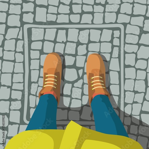 Selfie of feet in winter boots, jeans and yellow raincoat on cobblestone background, above view vector illustration