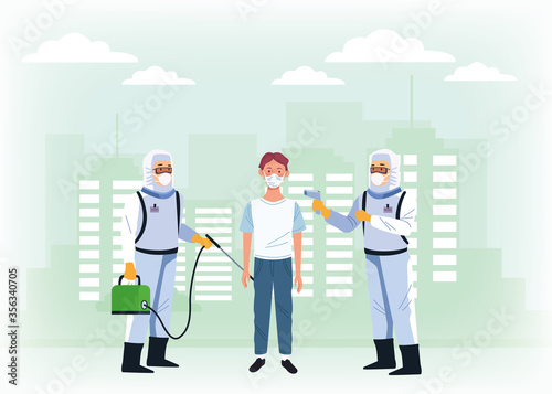 biosafety workers with sprayers disinfectant and patient for covid19