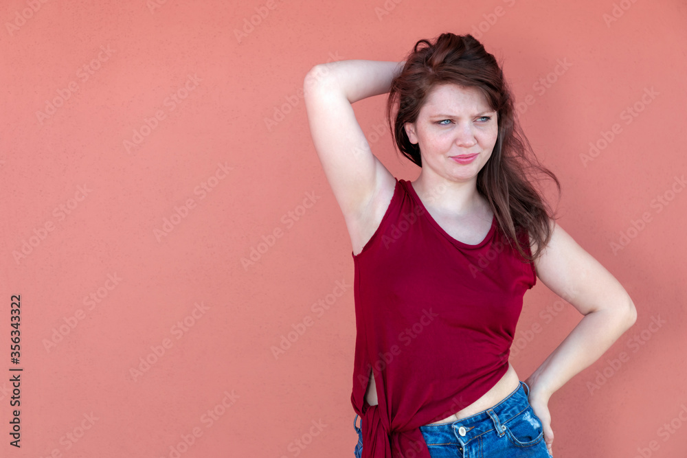 Bored expression - Girl half-length portrait on a pink background. Bored expression - Girl half-length portrait on a pink background.