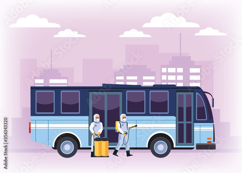 biosafety workers with sprayers disinfectant bus for covid19