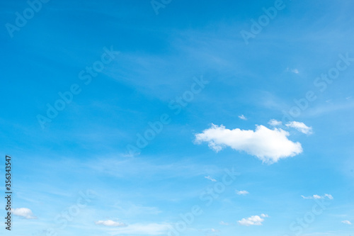 blue sky background with tiny clouds  © Thanasate