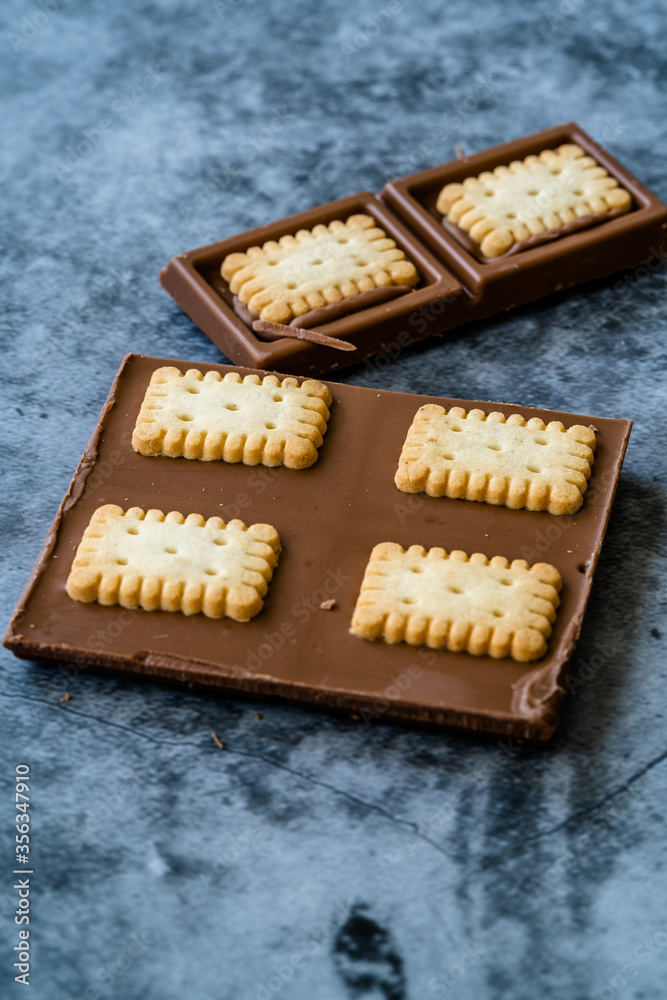 Chocolate Biscuit Cookies with Butter on Grey Background. Chocolate Biscuit Cookies with Butter on Grey Background.
