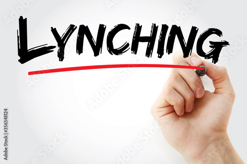 Lynching text with marker, concept background photo