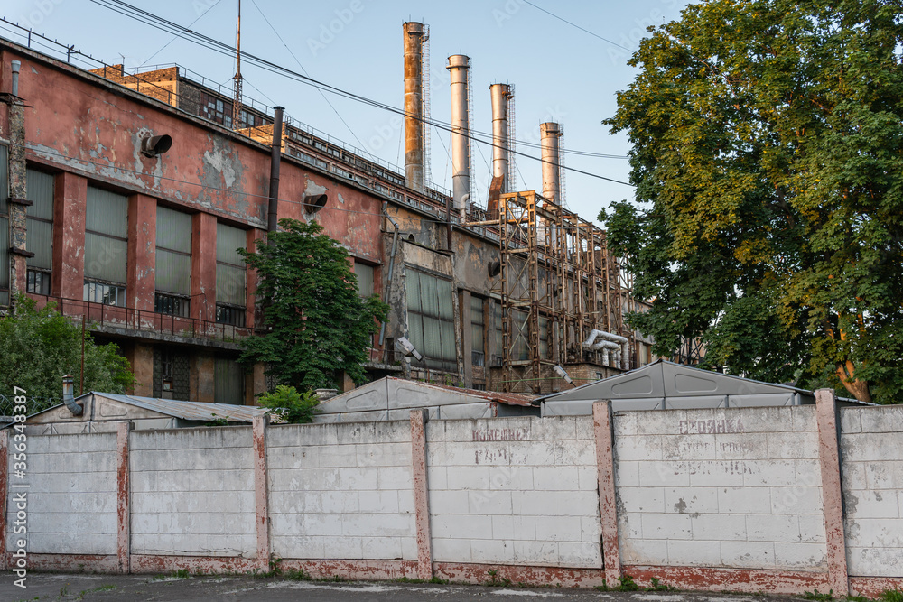 Kyiv (Kiev), Ukraine - June 08, 2020: An old Soviet rusty working factory (heat station №2) Kyiv (Kiev), Ukraine - June 08, 2020: An old Soviet rusty working factory (heat station №2)