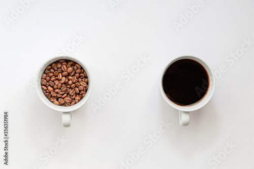 Flat lay view of, coffee beans and ready to drink coffee in a cup