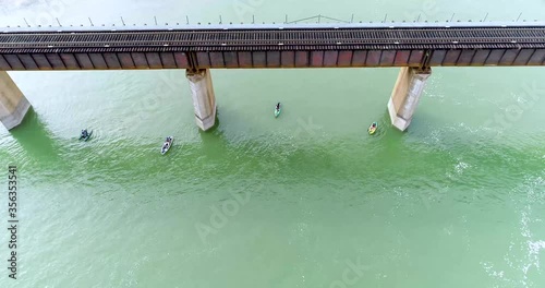 Aerial video of kayaks below the Lake Lavon dam in Texas. photo