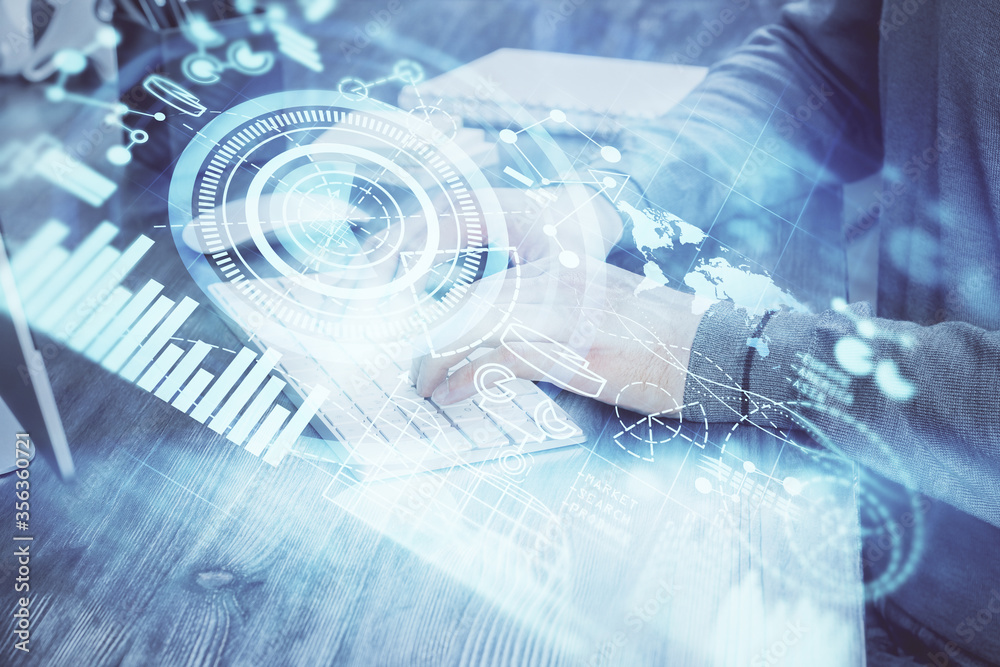 Multi exposure of businessman working on laptop on background. International business hologram in front. Concept of success. Multi exposure of businessman working on laptop on background. International business hologram in front. Concept of success.