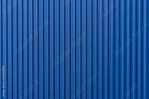 Striped Blue wave steel metal sheet cargo container line industry wall texture pattern for background.