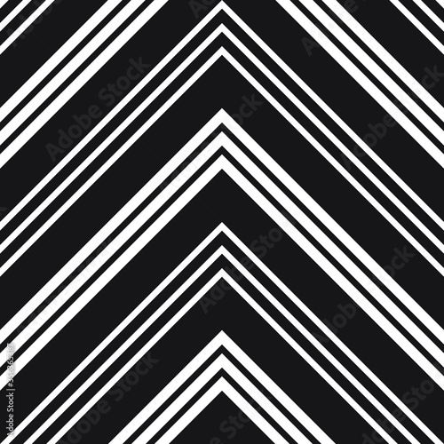 Black and White Chevron Diagonal Stripes seamless pattern background - Black and white Chevron diagonal striped seamless pattern background suitable for fashion textiles, graphics