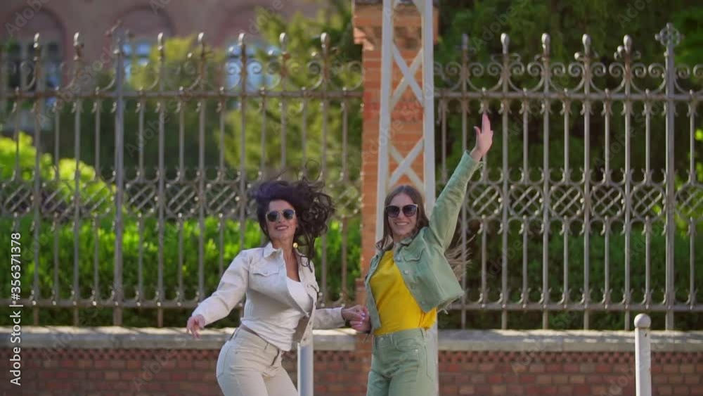 two girls are jumping two girls are jumping