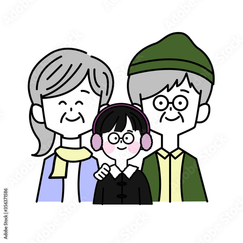 冬に楽しそうにする3人家族