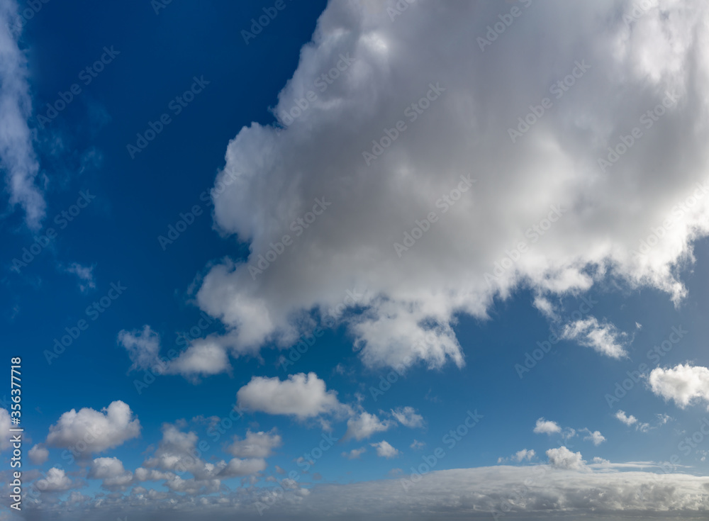 Fantastic clouds against blue sky, panorama Fantastic clouds against blue sky, panorama