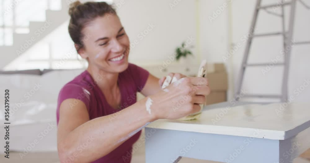Portrait of a Caucasian woman in quarantine during coronavirus pandemic, looking at camera Portrait of a Caucasian woman in quarantine during coronavirus pandemic, looking at camera
