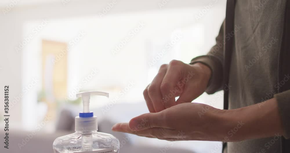 Woman in self isolation in quarantine during coronavirus pandemic washing he r hands Woman in self isolation in quarantine during coronavirus pandemic washing he r hands