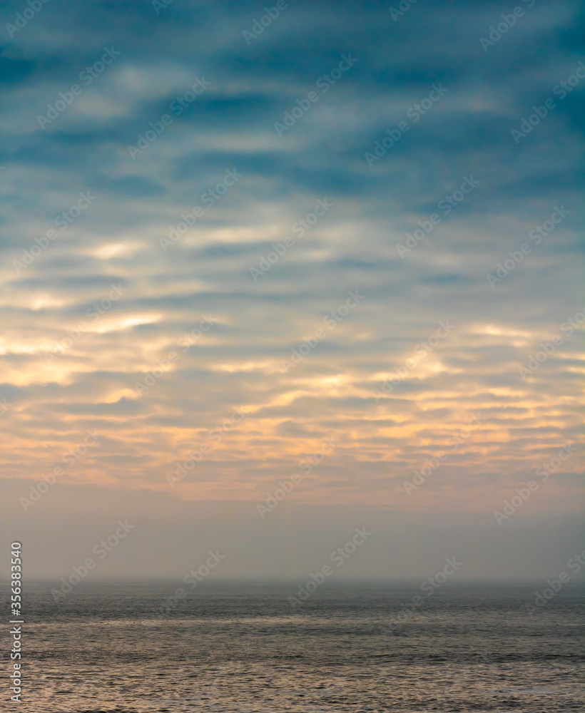 Beautiful Swirling Seas Hit the British Coast at Sunset Beautiful Swirling Seas Hit the British Coast at Sunset