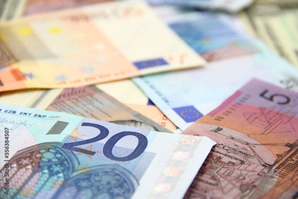 Close up of background from international paper money. Close up of background from international paper money.