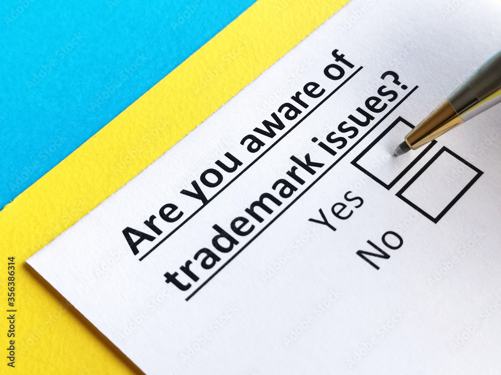 One person is answering question about trademark issues. One person is answering question about trademark issues.