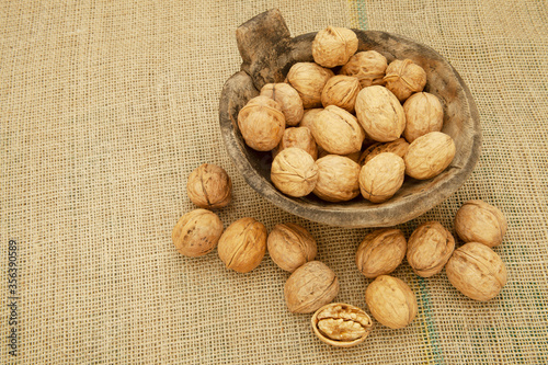 fresh and organic walnuts on plate