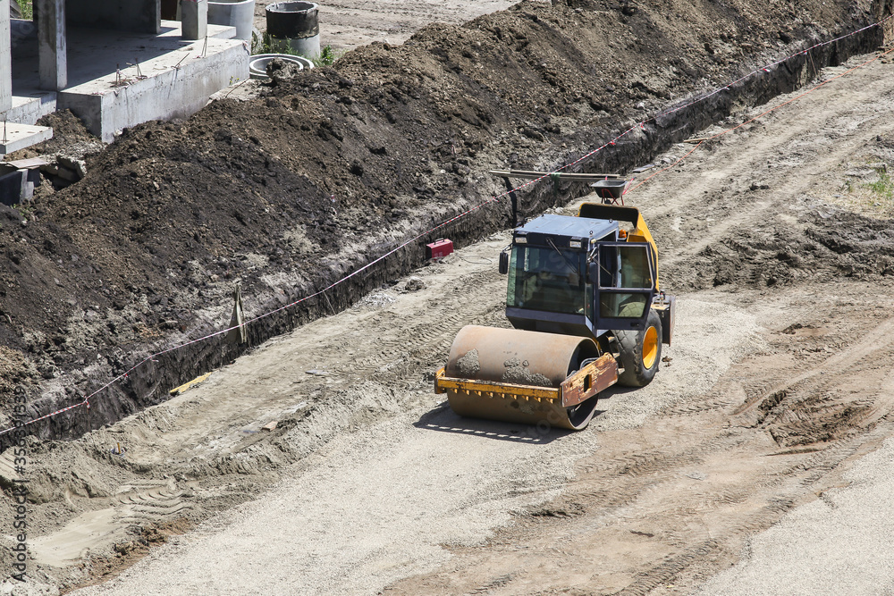 vibratory soil compactors at a construction site preparing the soil vibratory soil compactors at a construction site preparing the soil