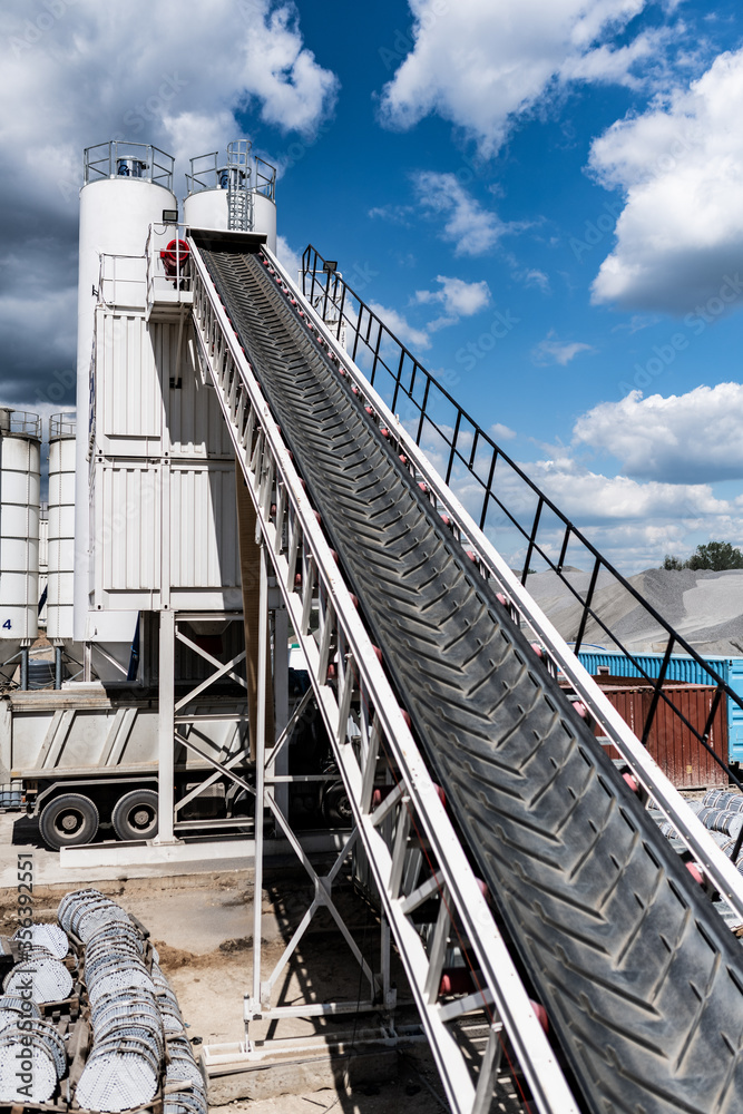 belt conveyor - transport of raw material on the production line - clean factory