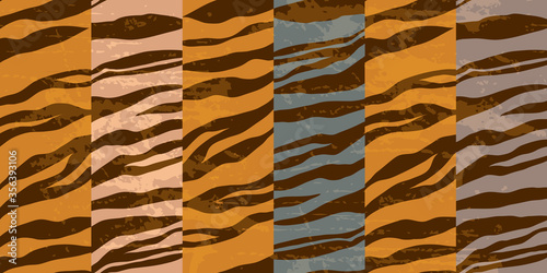 Modern animalistic pattern. Abstract stripes on a blue background. Hand-drawn vector illustration. 
