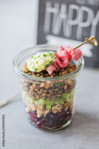 Lentil salad with beetroot, walnuts and roastbeef in a glass