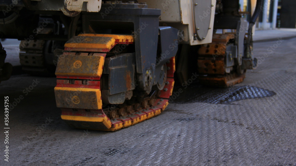 Construction site on the street and machinery. Construction site on the street and machinery.