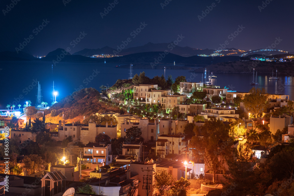 View of Bodrum harbor and Castle of St. Peter by night. Turkish Riviera. Bodrum marina