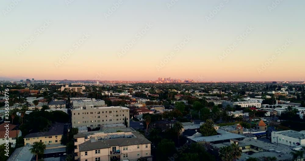 Sunset aerial drone view of Los Angeles, California, America - descending with downtown LA in the background Sunset aerial drone view of Los Angeles, California, America - descending with downtown LA in the background
