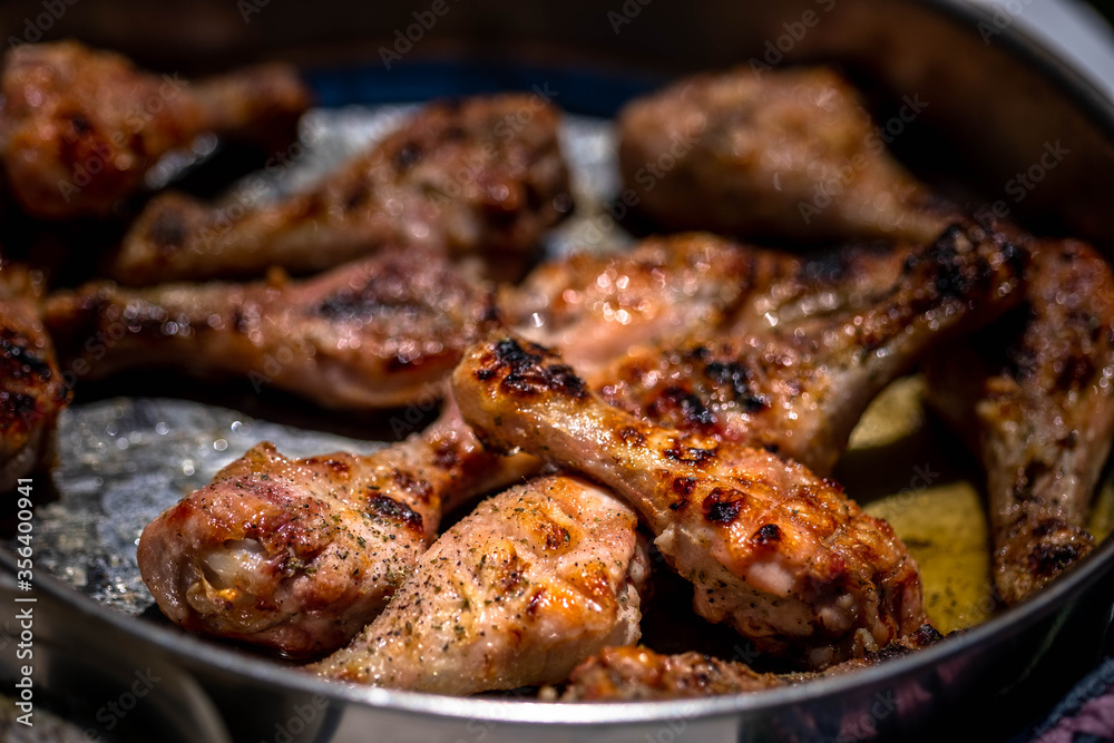 Tasty Crispy Oven Roasted Chicken Leg. Roasted chicken legs in a pan.