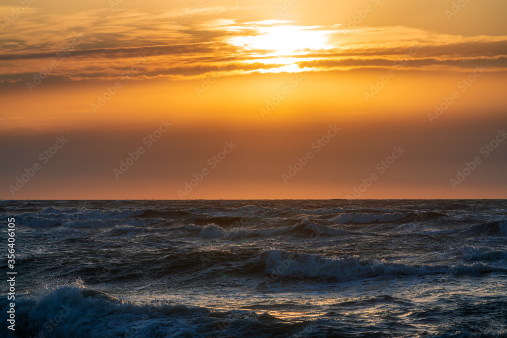 Stormy sea during sunset time Stormy sea during sunset time