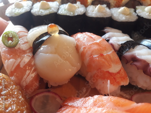 Fototapeta Naklejka Na Ścianę i Meble -  Sashimi and sushi close up. rice and fish japanese food