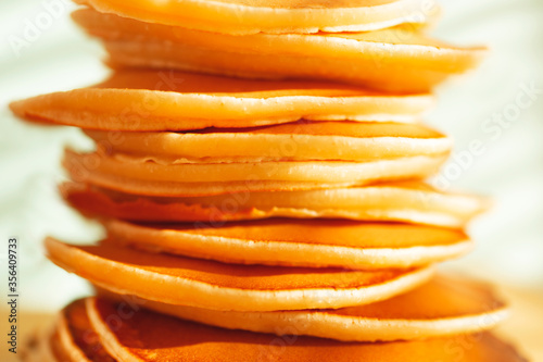 Stack of tasty home cooked pancakes. Close-up. Soft selective focus.