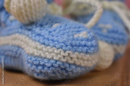children's hand-made knitted shoes © Igor