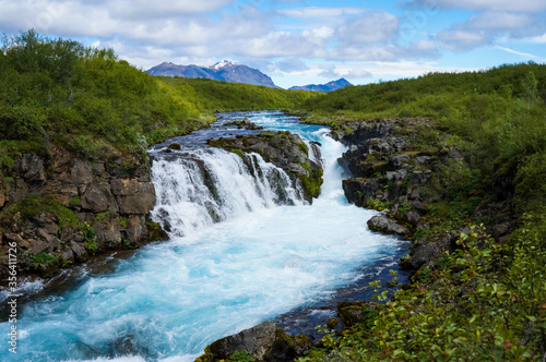Fototapeta Naklejka Na Ścianę i Meble -  South Iceland Bruarfoss Waterfall with turquoise water flowing