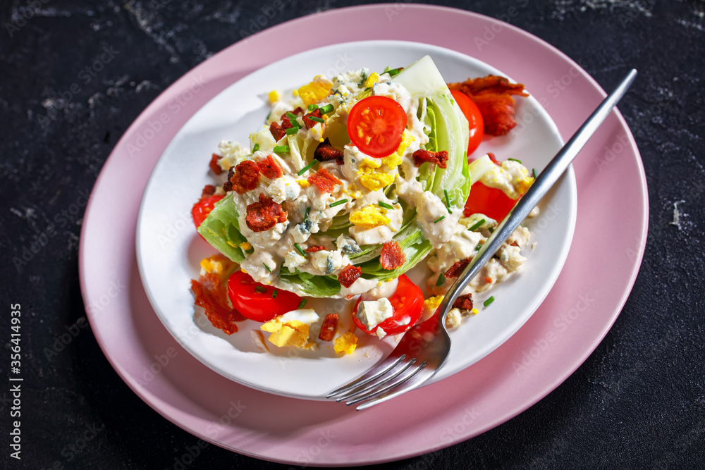 iceberg wedge salad on plates, top view iceberg wedge salad on plates, top view