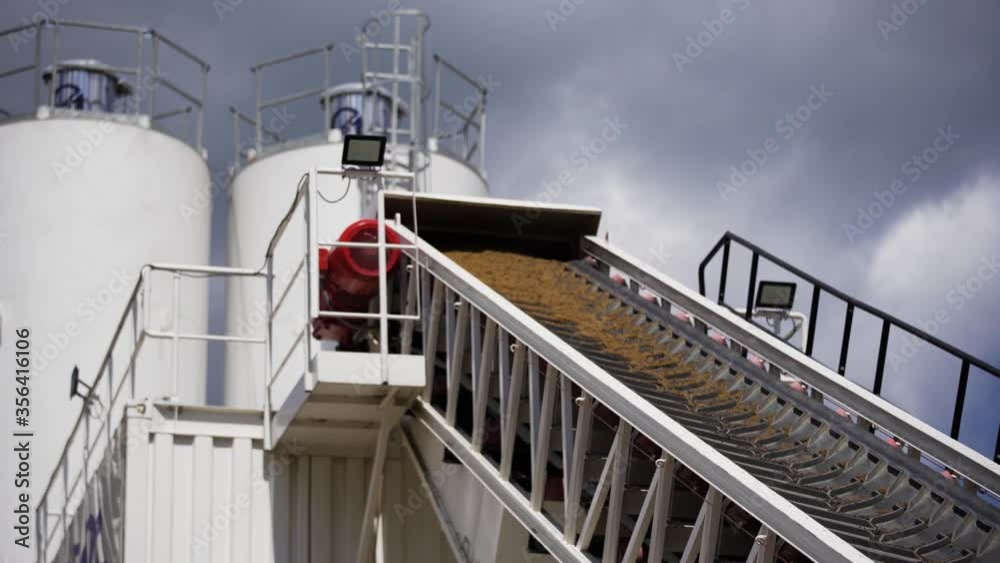belt conveyor - transport of raw material on the production line - sand, aggregate - view of the mine