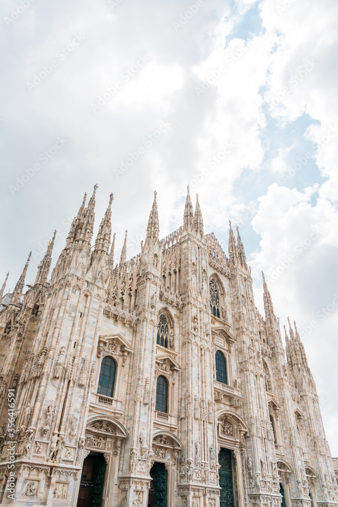 MILAN, ITALY - May 29, 2018: street view of Milan Cathedral, Dome de Milan is the cathedral church