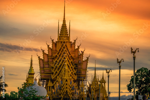 The background of religious attractions in Phitsanulok Province  Wat Chan Tawan Tok  has a distinctive golden yellow sculpture  close to the Nan River  tourists always come to make merit in Thailand