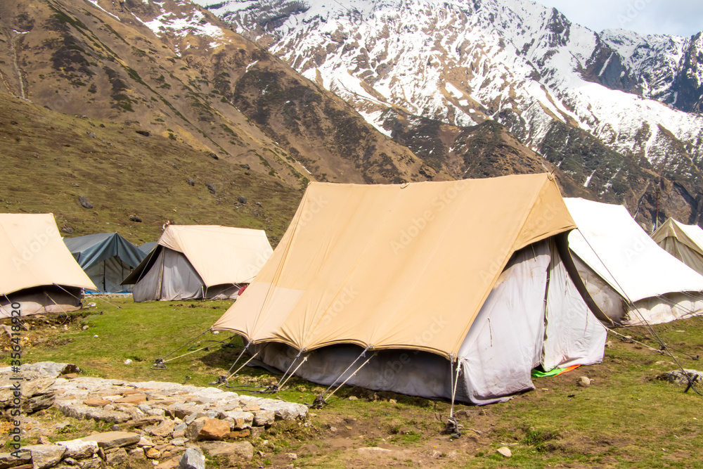 Images of tents for tourists at hilly area
